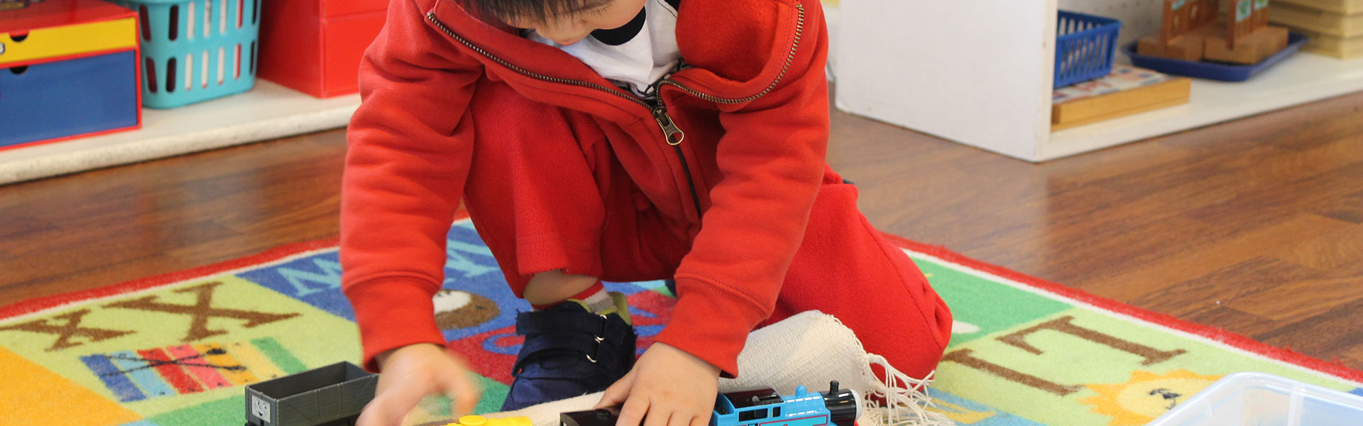 Montessori child playing with STEM products